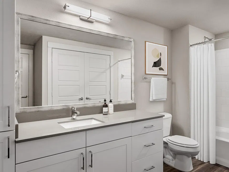 Drawers under the vanity keep the counter clear of everyday clutter.