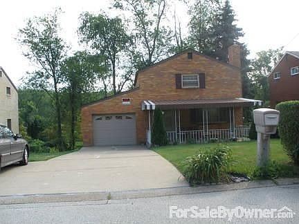 Front View : w/porch & driveway for 3cars