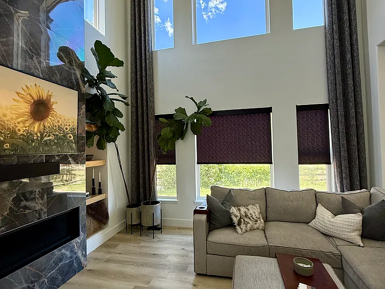 Custom Hunter Douglas automatic shades halfway closed