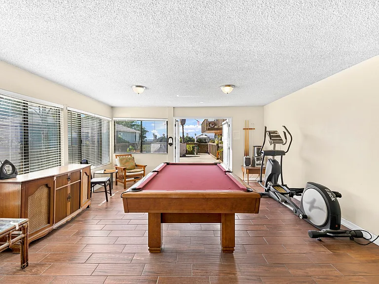 Community pool table in building's Rec Room