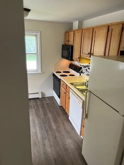 kitchen with dishwasher and over the range microwave