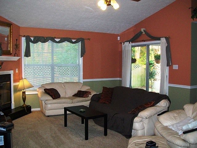 Living Room with Doors to Patio and Backyard
