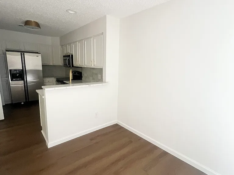 Additional dining or office space looking towards kitchen