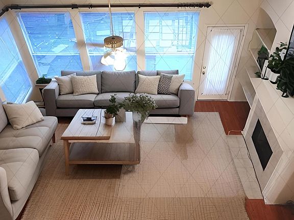 High ceiling family room AI staged