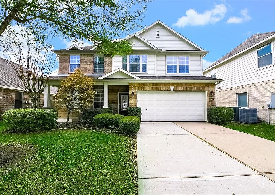Welcome to 2910 Biscayne Springs Lane, a stunning traditional 2 story home with decorative brick row locks in the sought-after Shadow Creek Ranch.