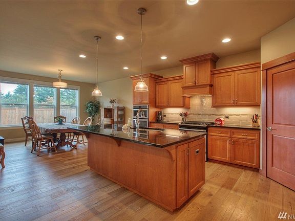 Spacious kitchen with dining nook. 