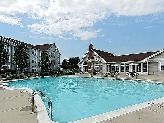 Community Pool and Clubhouse. Clubhouse contains a small gym as well