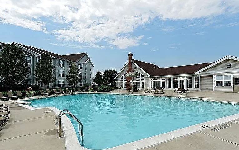 Community Pool and Clubhouse. Clubhouse contains a small gym as well