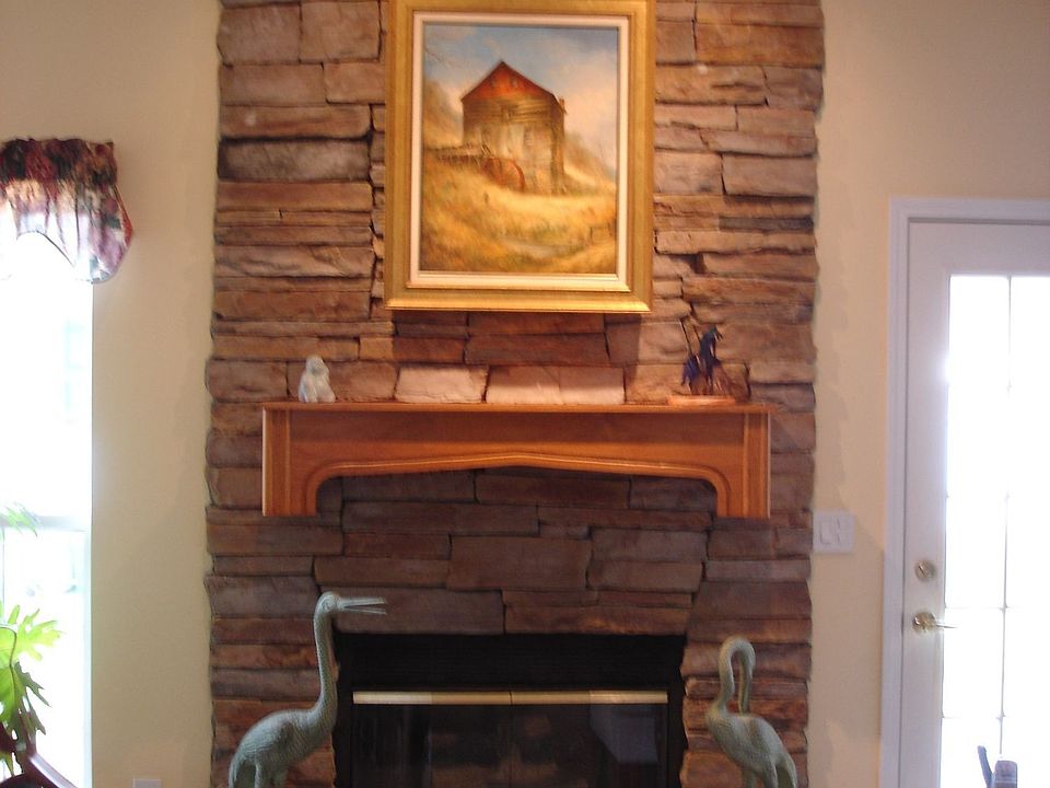 Close up of stone fireplace to warm those chilly nights.