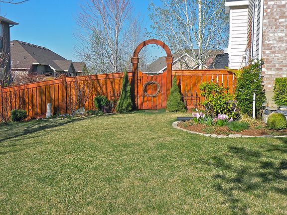 Beautiful wood Fence and lanscaping