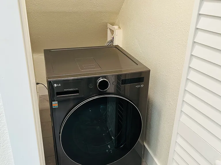 Brand new washer/dryer in kitchen closet. Plus washer in basement too