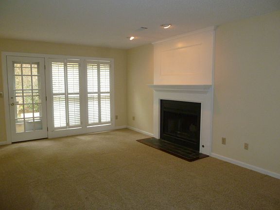 very spacious with fireplace and access to rear patio