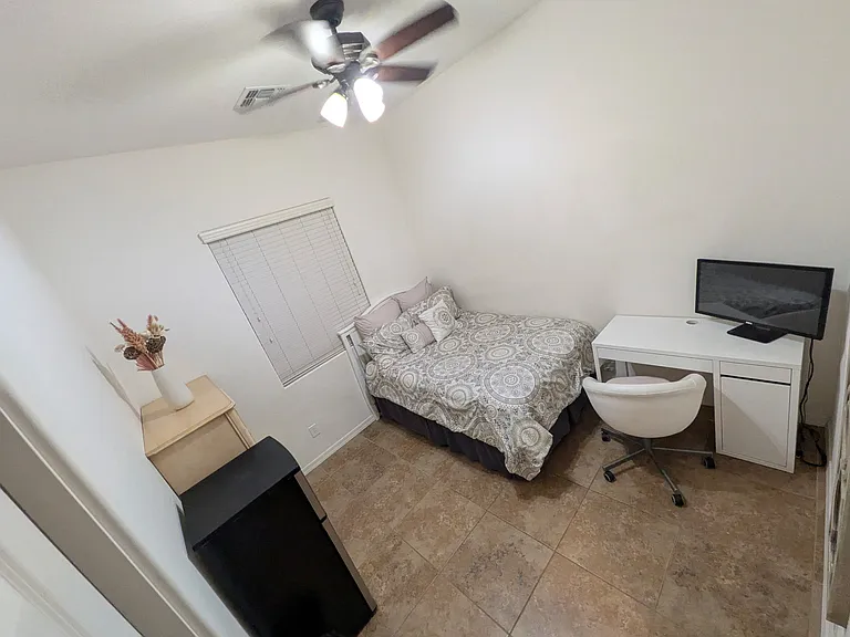 Birds eye view of the complete private room with a door lock and key.