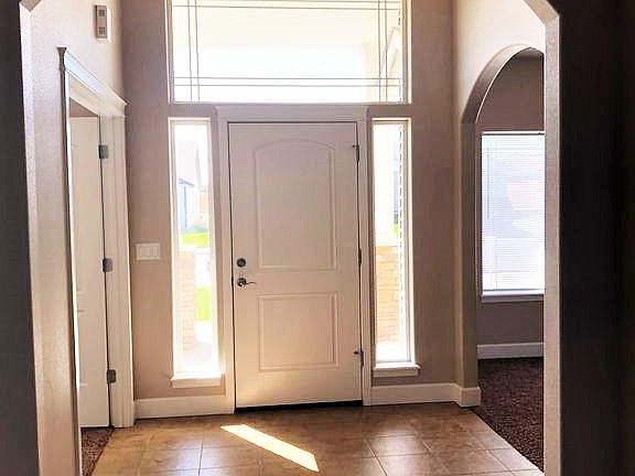 Gorgeous tiled entry. In this view office is to the left and