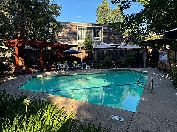 Community pool with security gate and area to entertain guests. Open 6am to 10pm daily.