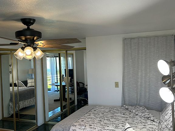 Two full closets, ceiling fan.