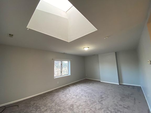 Extra large living room with sky light can accommodate 3 couches