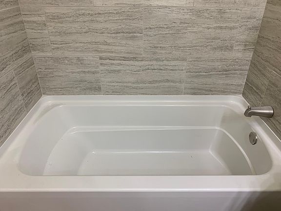 New tub and tile shower closets are the