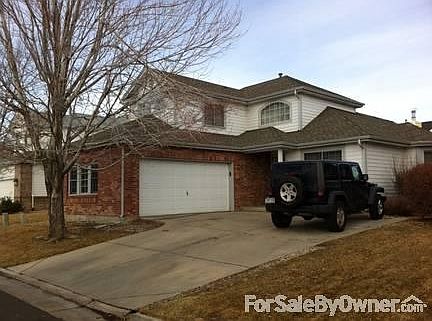 Front View
						:
						Large driveway facing south, 2-car gar. Mature tree in front yard ,spklr system.