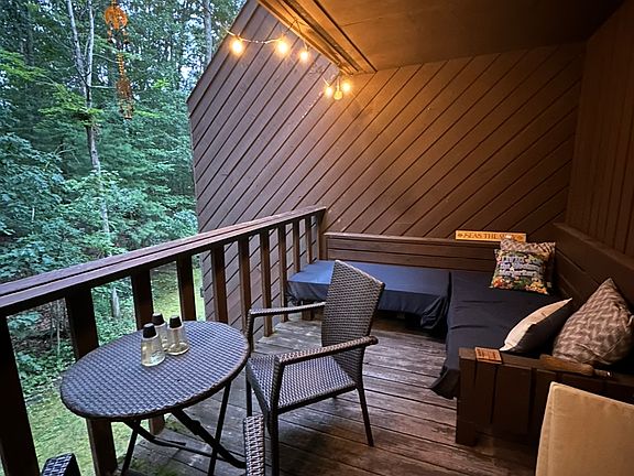 Private covered deck off of living room