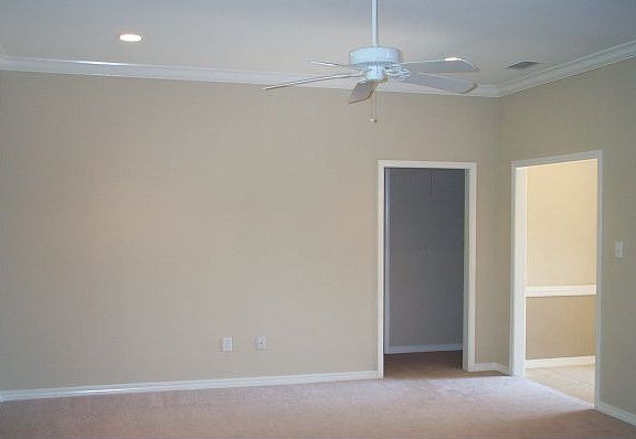 Living room has recessed lighting and 9' ceilings.