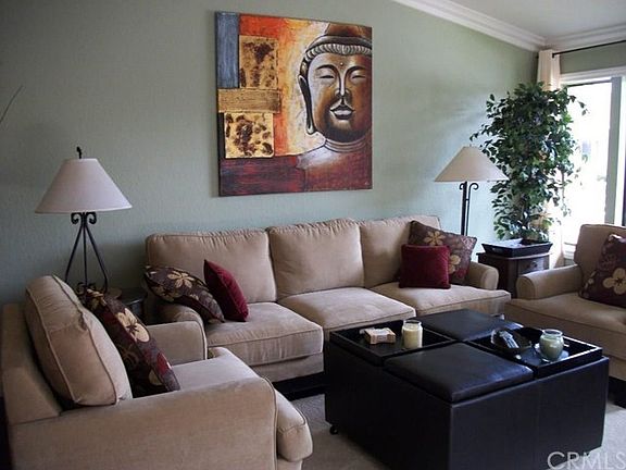 Living Room is light and airy. Although, for a cold night there is a free standing fireplace.