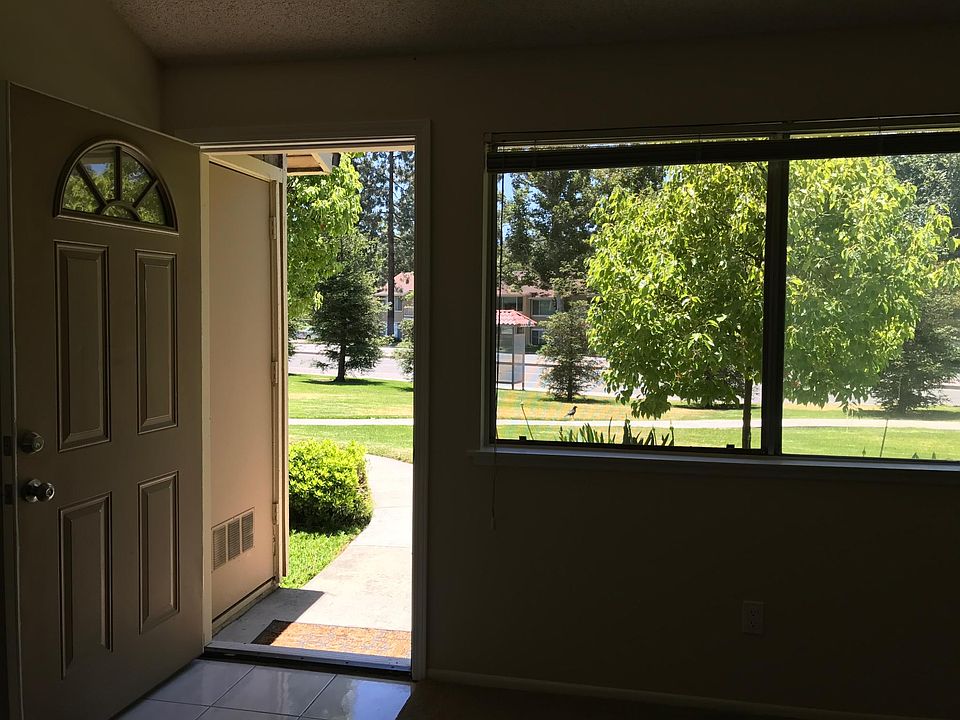 Living room, looking out front door. 