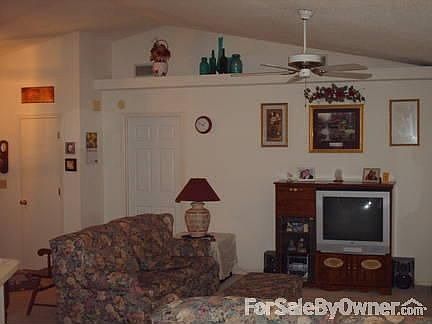 Another view of Living Room : Garden shelf. Cathedral Ceiling.