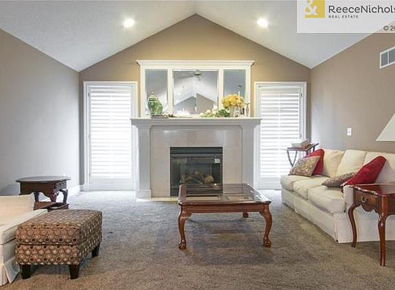 Great room with fireplace and vaulted ceiling