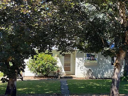Front of house. "off street parking" for one car in front in addition to parking in a shared driveway