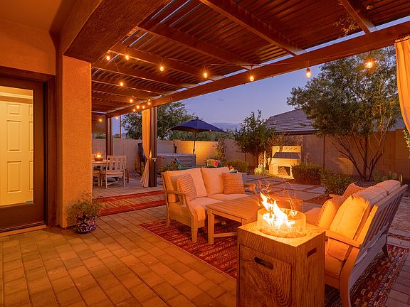 Whether it's coffee or cocktails-- sitting outside by the fire is the ultimate. When it gets warmer, the misters along the terrace keep things cool.