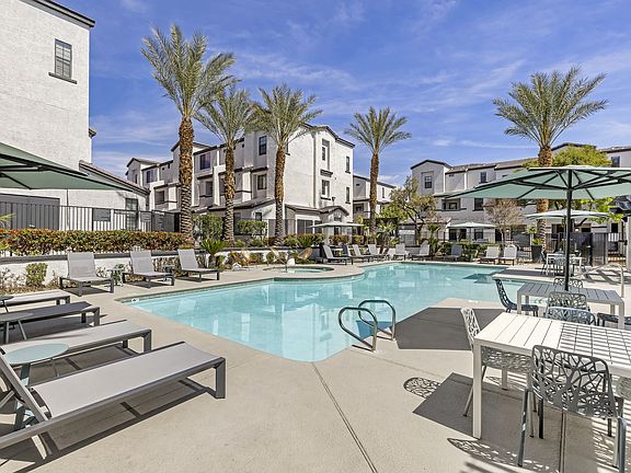 Dive into luxury living at Michael B Apartments, where every day feels like a vacation with our resort-style pool and inviting lounge area.