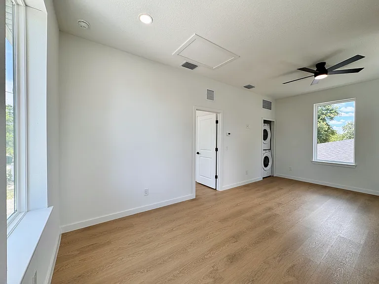 Open kitchen and living space with ample natural light.