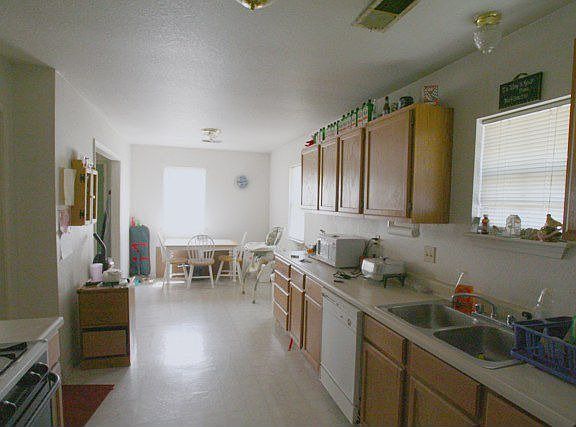 The remodeled kitchen has lots of storage