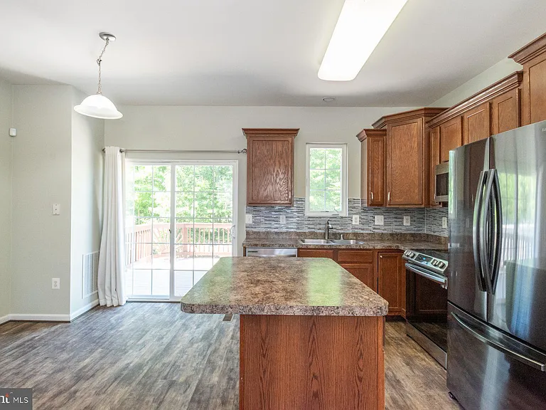6810 Warfield St — Photo 5