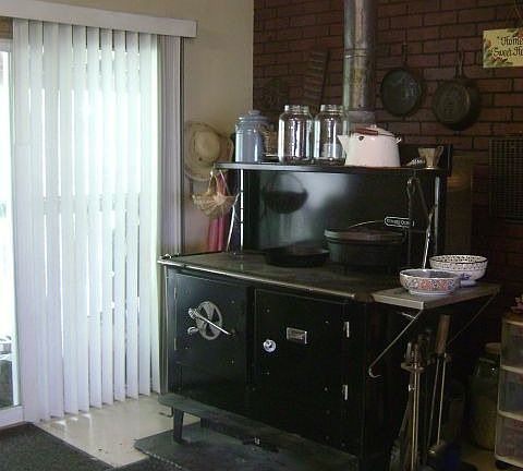 Amish-built woodburning cookstove/oven (negotiable)