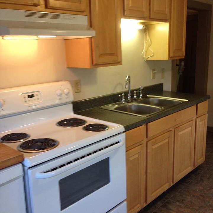 Kitchen with new stainless steel oven (not shown) and pantry