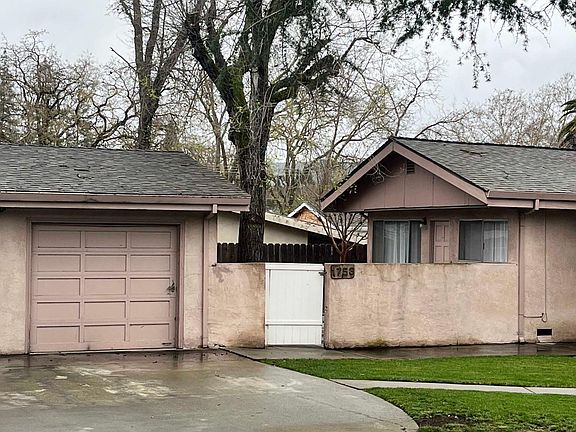 Duplex with 1 car garage.