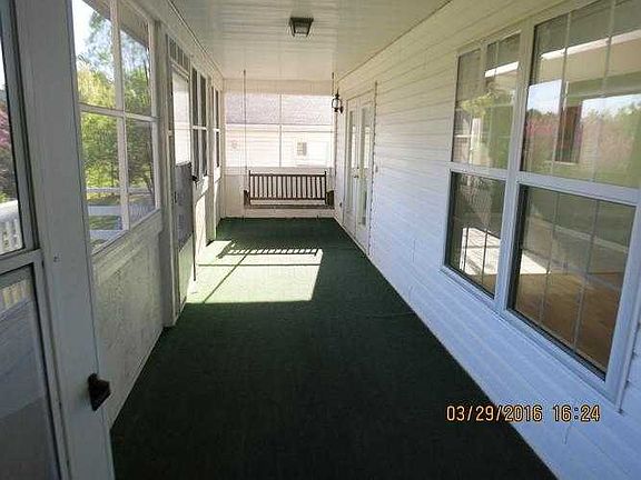 Rear enclosed porch
