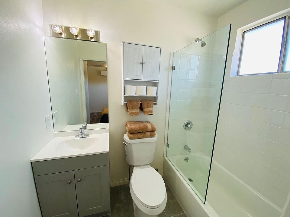 Raised, elongated toilet completes the full, brand new bathroom.