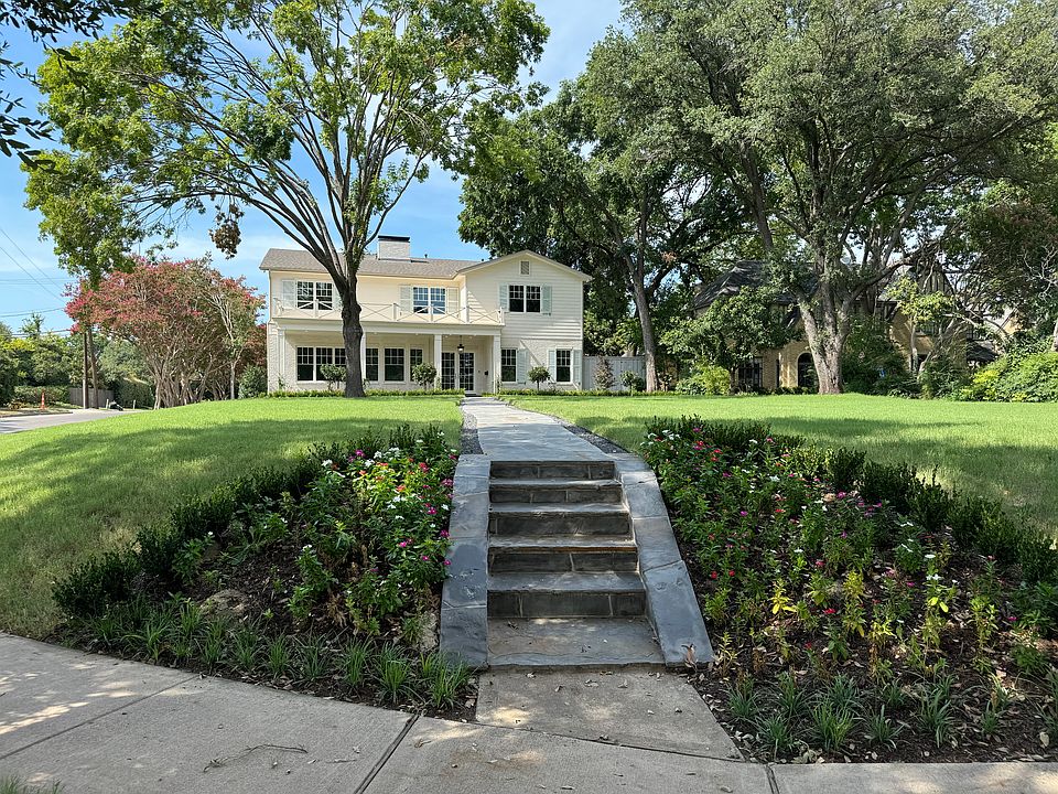 Expansive front lawn overlooking Lakewood Boulevard and Lakeshore Drive.
