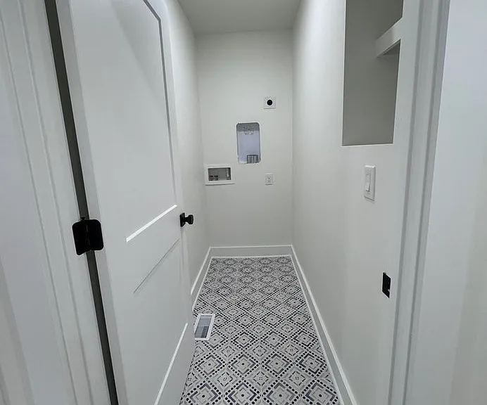 Laundry room. Washer and Dryer appliances have not arrived at the time of pic.