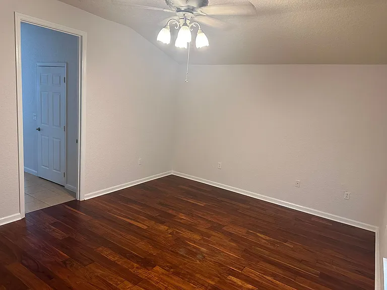 Master bedroom with ensuite bathroom. Entry to bathroom and Walk-in closet