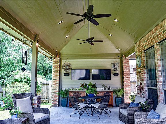This amazing, perfect for entertaining covered patio adds an additional 330 sq. ft. of family enjoyment. The high ceilings will and fans will keep you cool and protected year round. Recessed lighting provide the perfect venue for parties at any time.