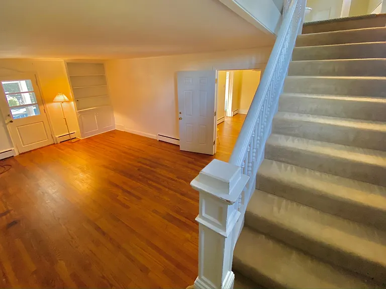 LIVING ROOM AND STAIRS