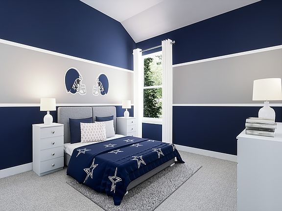 A cozy and stylish bedroom with navy blue walls, a white bed frame, and decorative elements such as