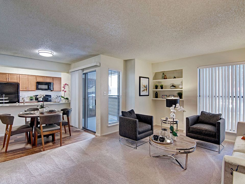 A living room with a large sliding glass door