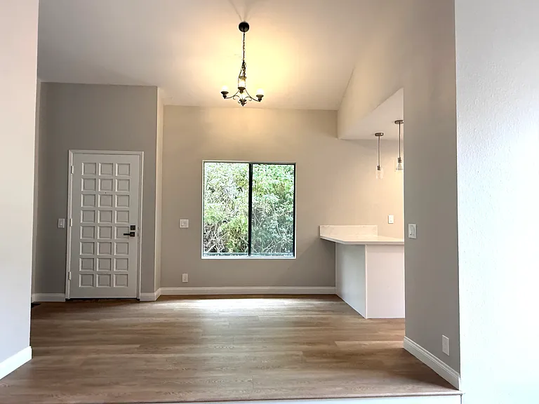 Entrance, light and bright, brand new floors and paint