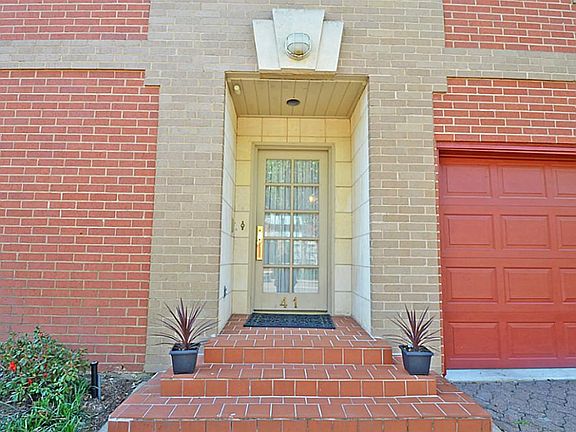 You will love coming home to this home in a  private, gated community!