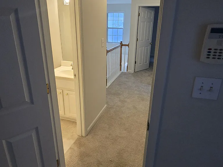 View from the primary out to upstairs hallway